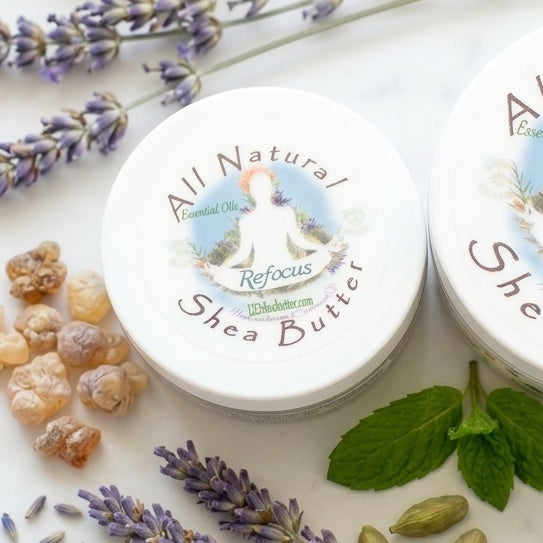 Jar of All Natural Refocus Shea Butter with lavender and other botanicals on a white background