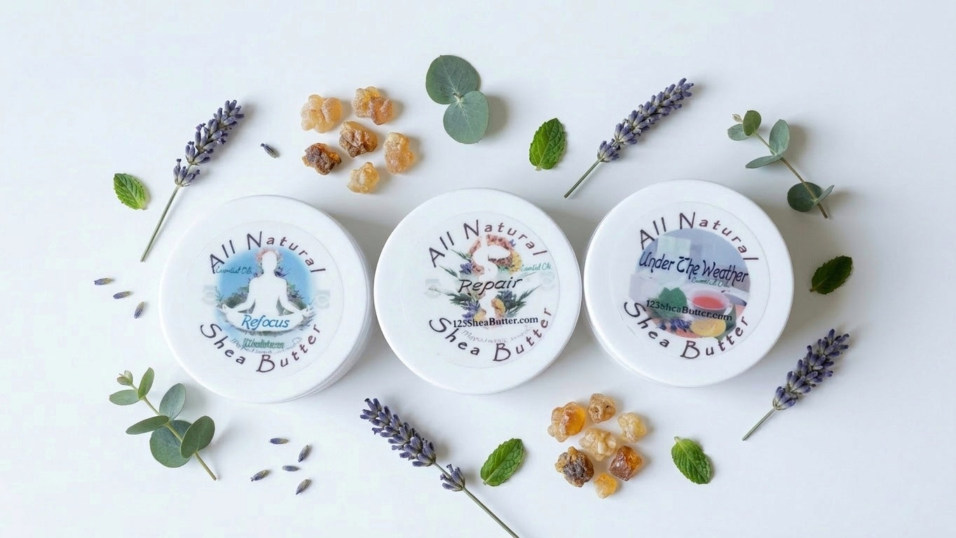 Three containers of All Natural Shea Butter with herbs and flowers on a white background