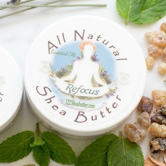 Jar of All Natural Refocus Shea Butter with natural ingredients around it