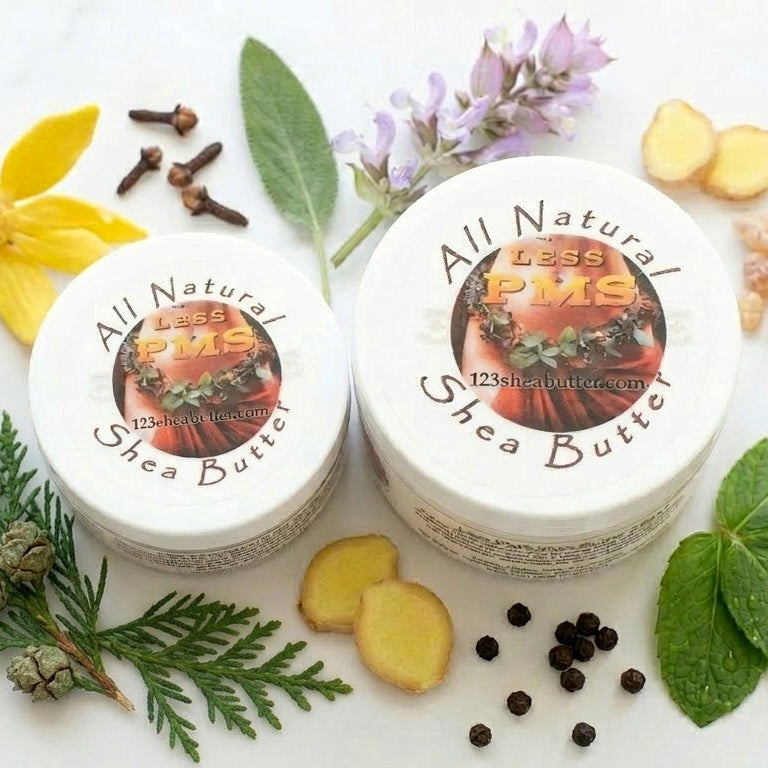 Two containers of Less PMS All Natural Shea Butter with Clary Sage, Ylang Ylang, Ginger, Peppermint, Black Pepper, Frankincense resin, Cypress leaf and cloves on a white background