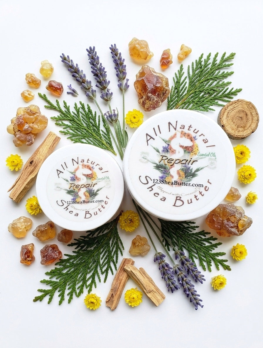 Two containers of All Natural Shea Butter surrounded by natural elements like lavender, sandalwood, and helichrysum, myrrh and frankincense resin pieces on a white background.