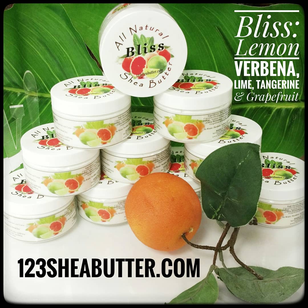 jars stacked of Bliss Shea butter with green background, tangerine in front and the words: "Bliss lemon verbena, lime, tangerine and grapefruit"